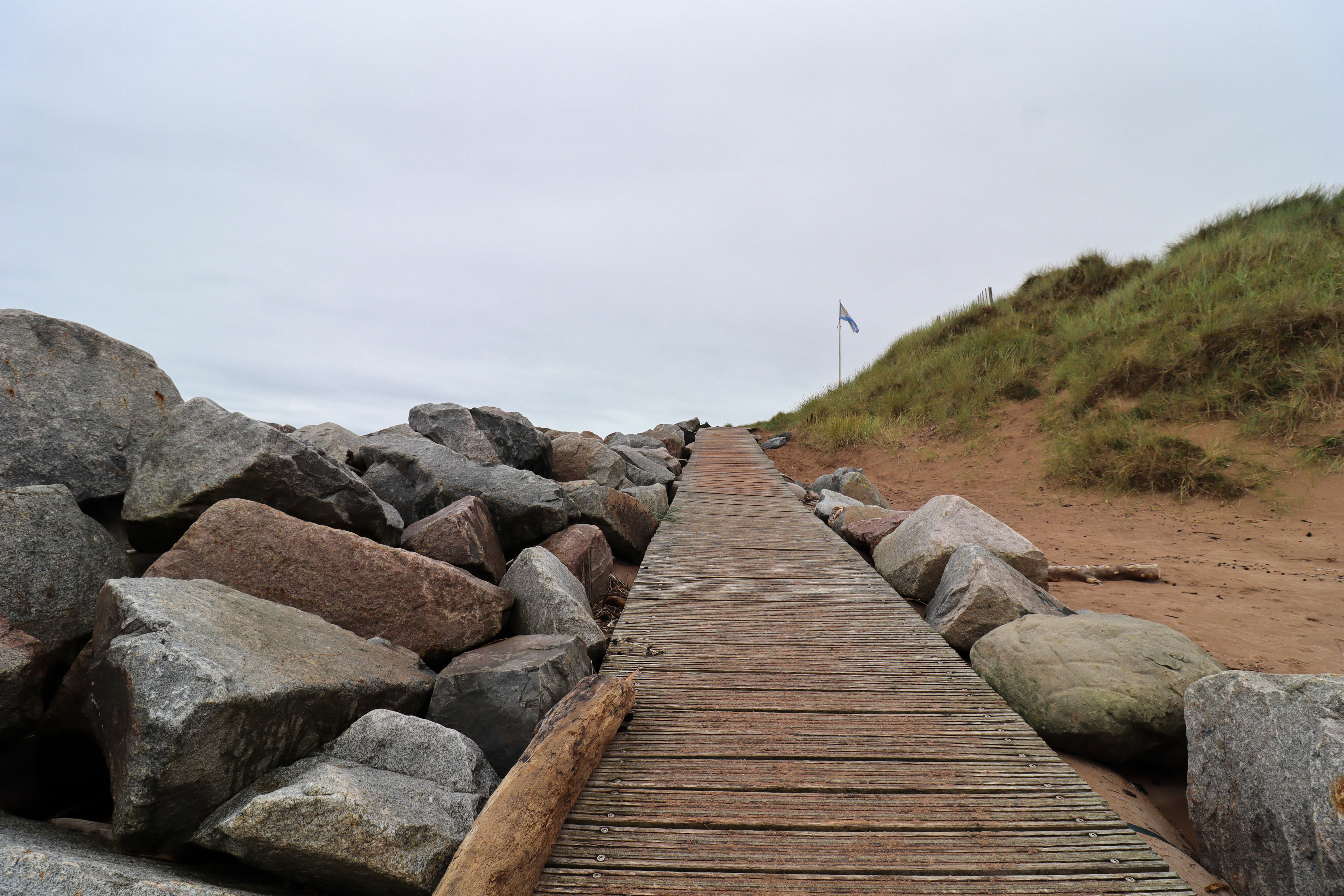 Duckboard path going down to the beach