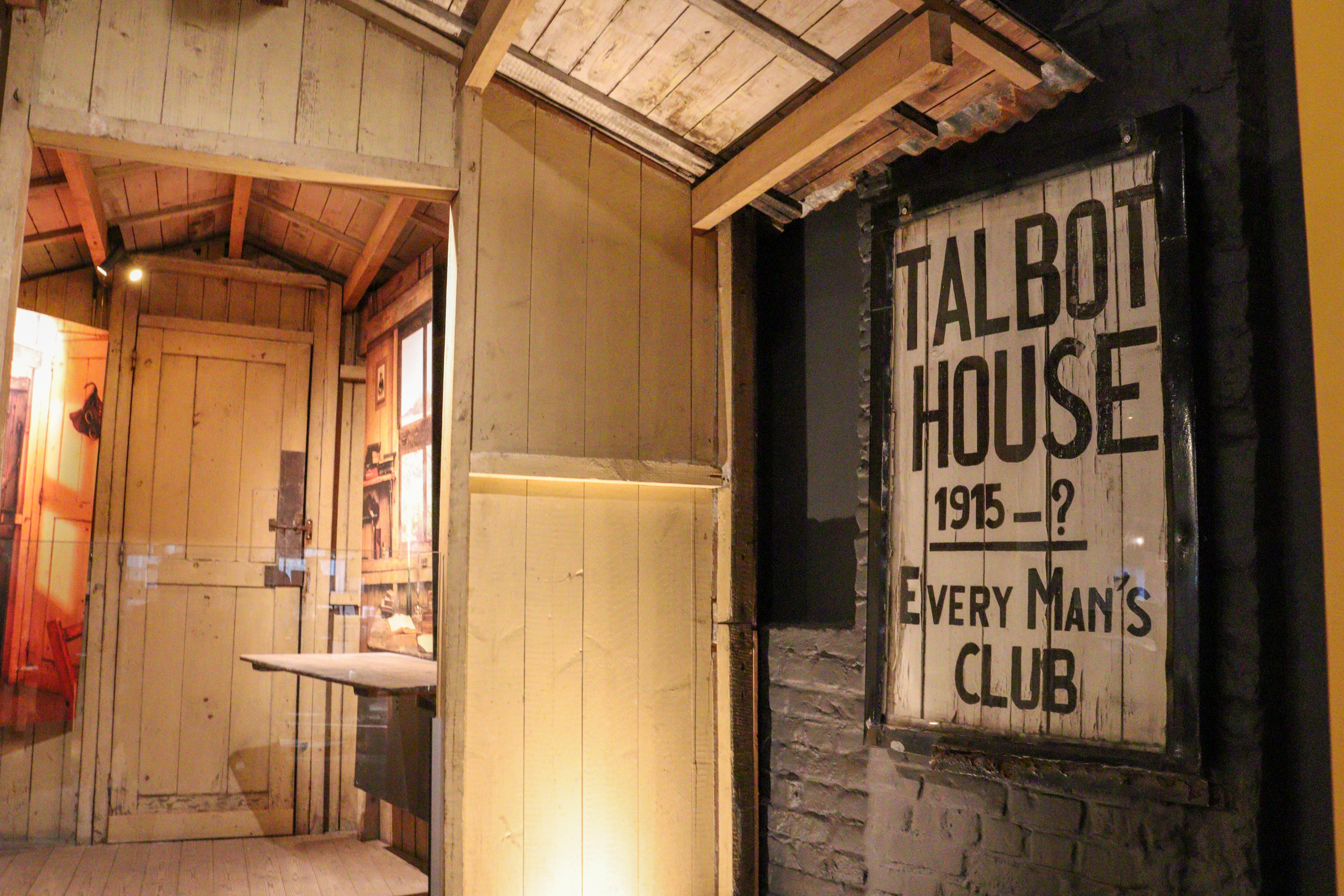 Shed with a large sign for Talbot House. It reads Everyman's club, 1915 to question mark