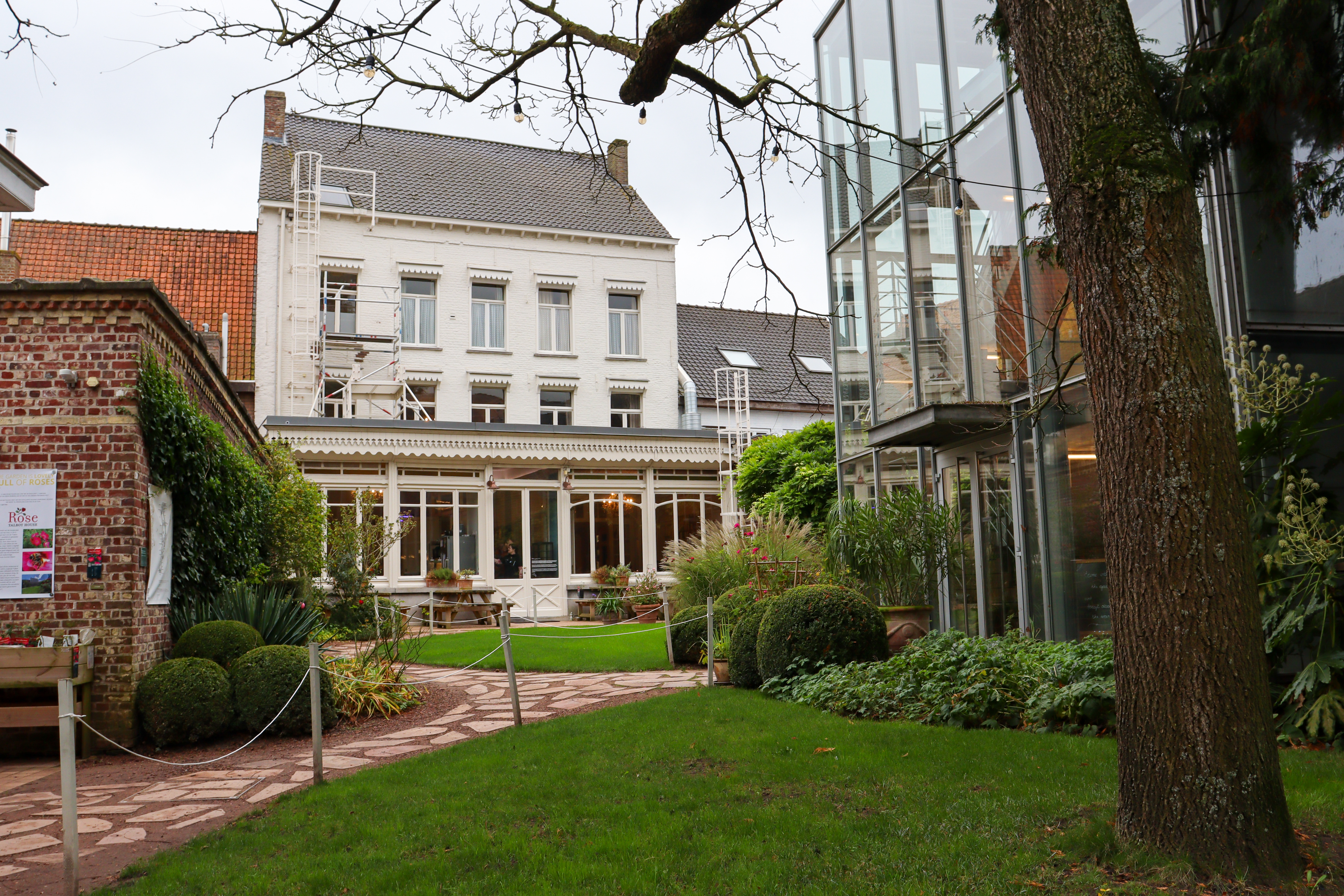 End of garden with Talbot House, a 3 storey white building, at the end