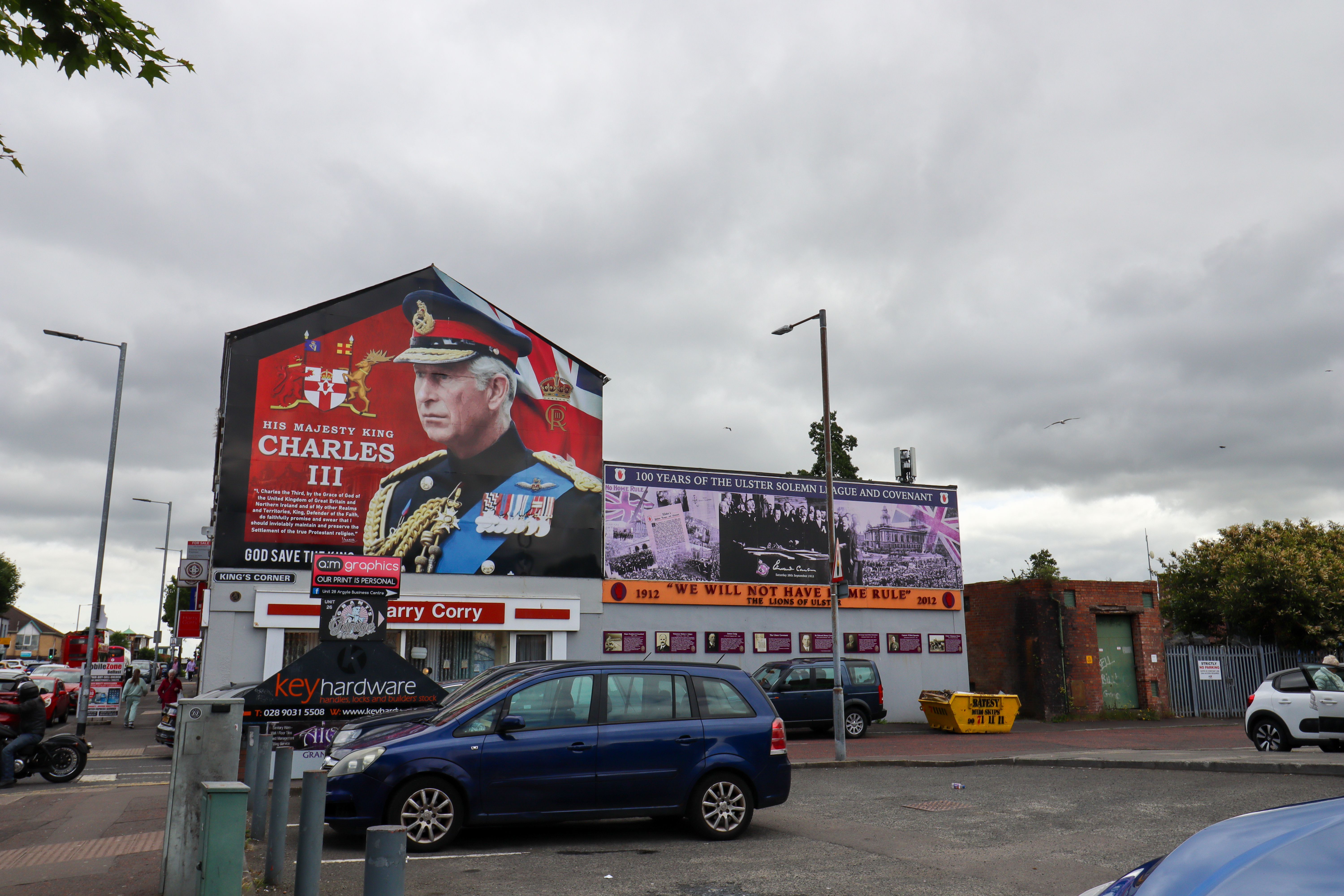 Mural of His Majesty King Charles the third in full military uniform.