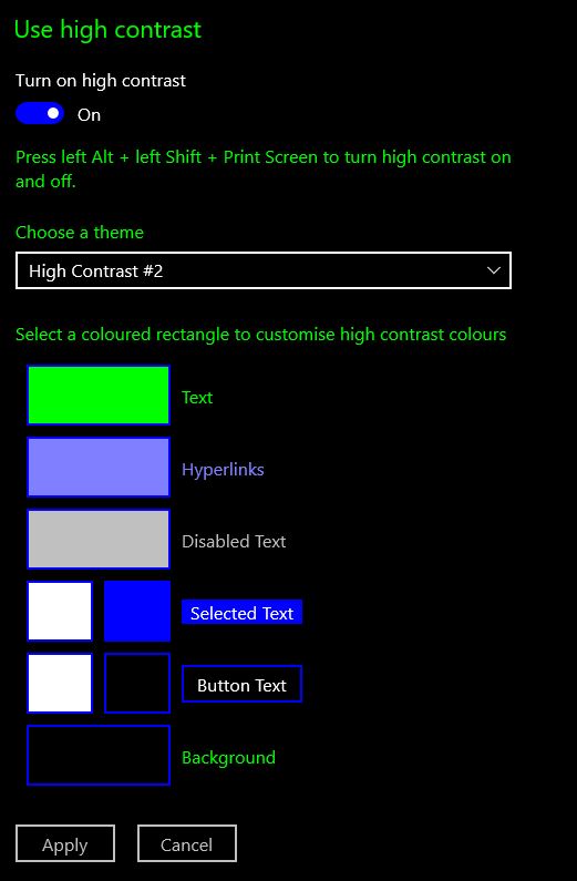 High contrast theme 2 turned on, which has green text on a black background