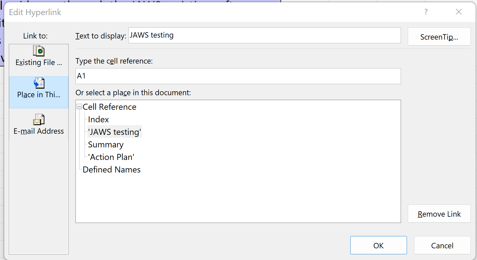 Screenshot of edit link box with place in this document selected and a worksheet and cell destination given